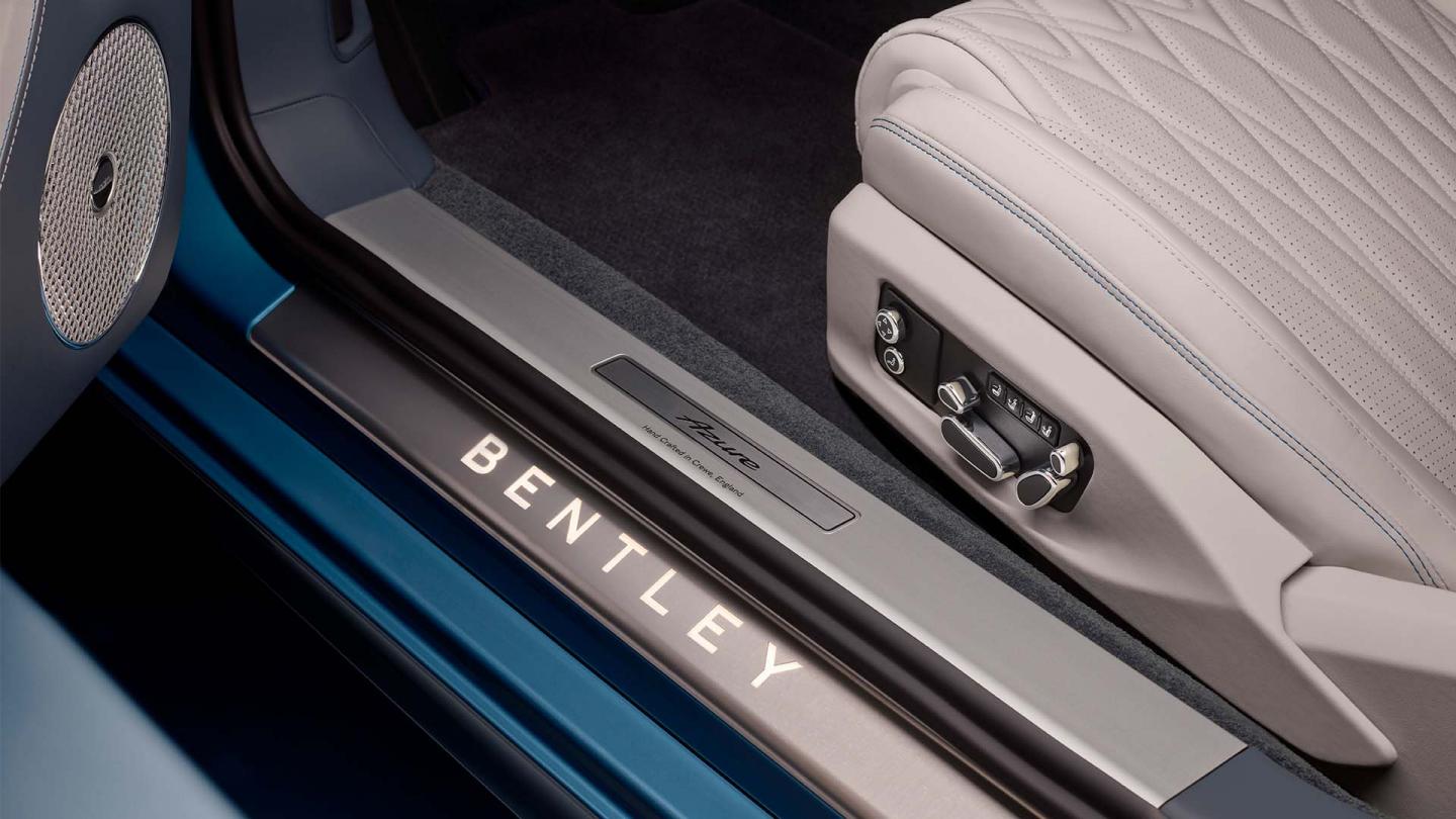 The front cabin of the new hybrid Bentley Continental GT Mulliner with a exclusive Mulliner colour split with Linen main hide and Damson secondary hide