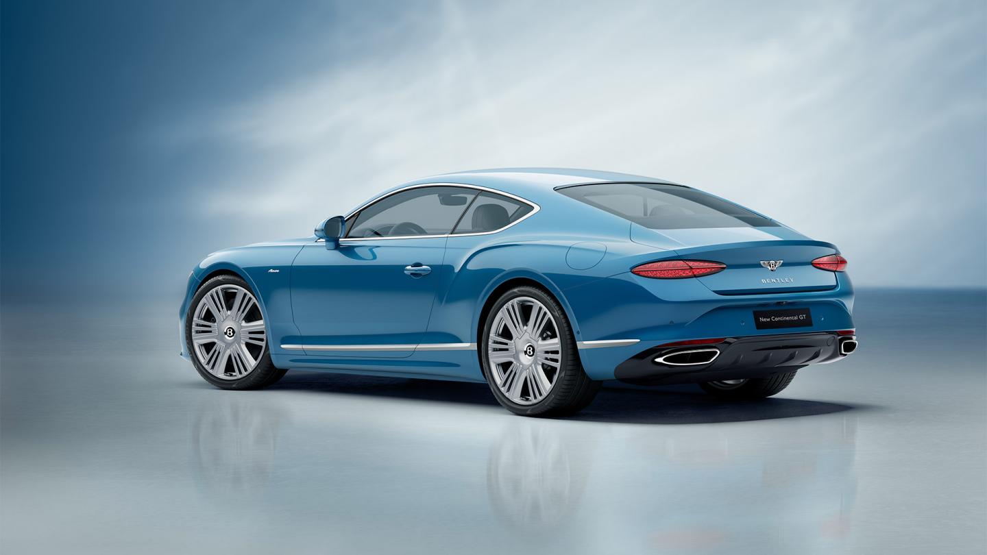 The rear cabin of the new hybrid Bentley Continental GT Mulliner with a exclusive Mulliner colour split with Linen main hide and Damson secondary hide
