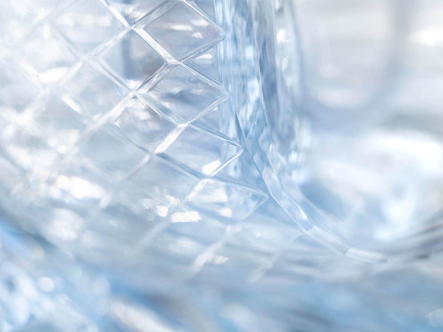 Detailed textured view of Bentley Bentayga Azure Intelligent Full LED matrix headlamps with diamond cuts.